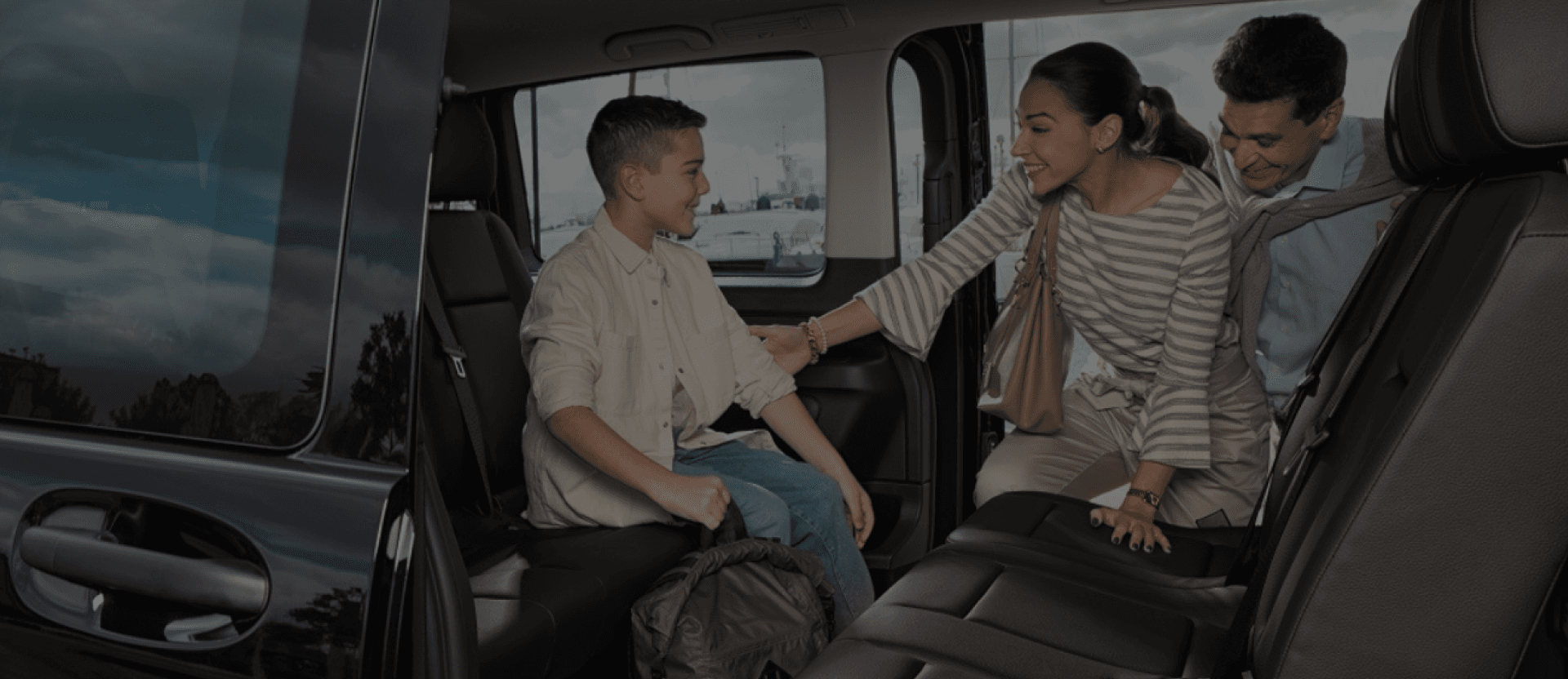 Van with happy family